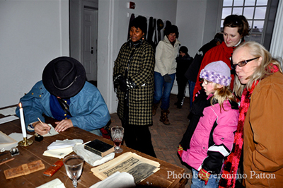 www.allmichigancivilwar.com - Welcome to the main page.  This image shows a view of guests at a historic site seeing history come to life up close.